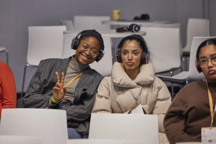 Young listeners with interpreting headphones