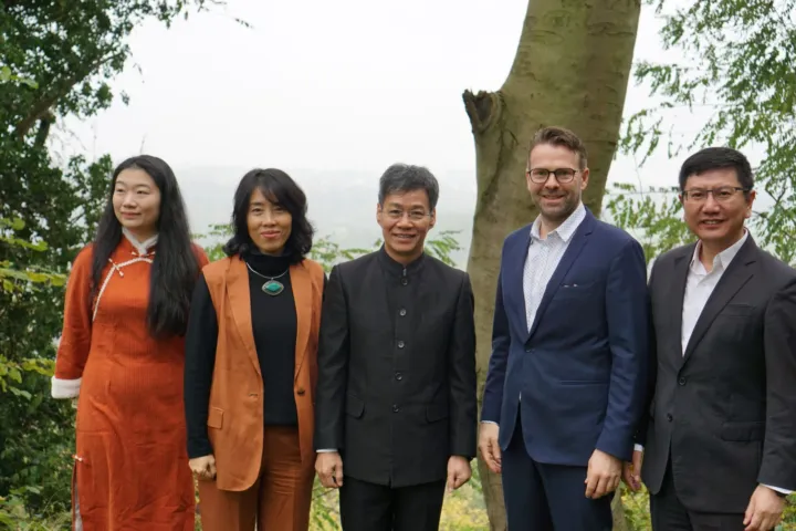 Five participants of the 2024 TCM Conference in the hospital garden